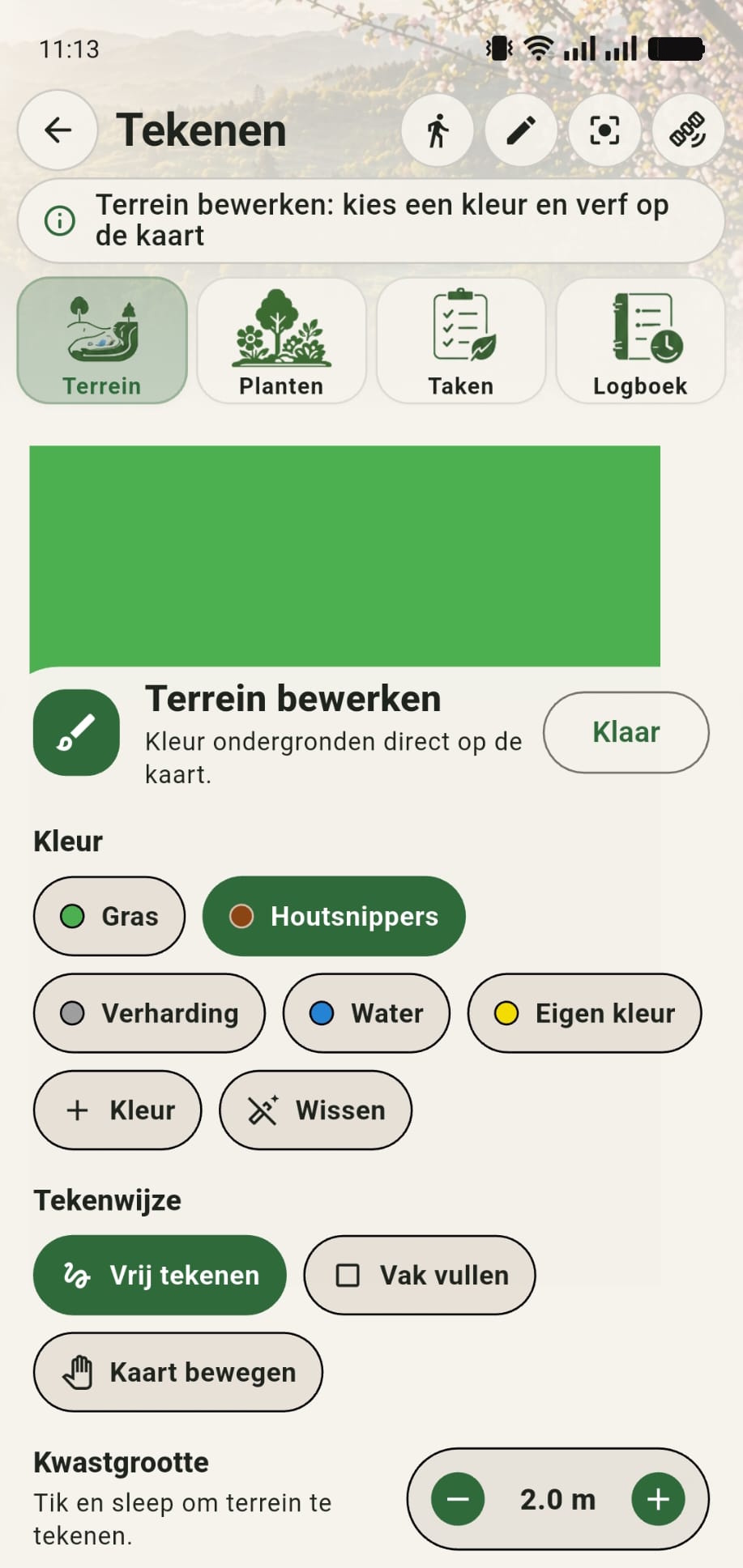 GreenPlot terreininstellingen met houtsnippers actief en kwastdiameter op 2 meter